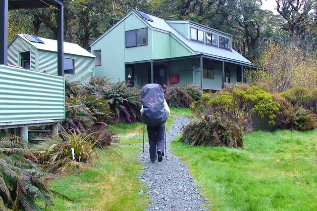 Heading out in the rain past Lake Mackenzie Hut