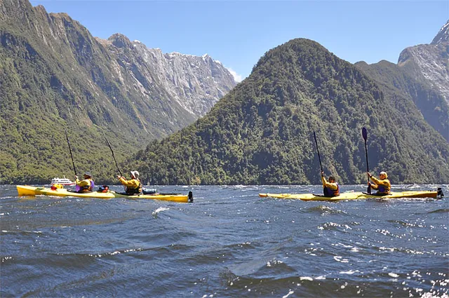 Using paddles as sails to catch the wind from behind worked very nicely
