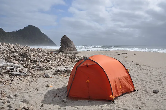 Camping on Scotts Beach. Not DOC prescribed, but no running water at the camp site. Nearly got washed away in the morning though with the floods! Not so clever as it turns out