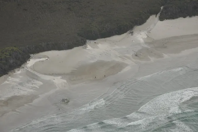 Looking down on South Coast Track hikers