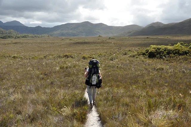 An idyllic walk across the grassy plain to the end of the Red Point Hills