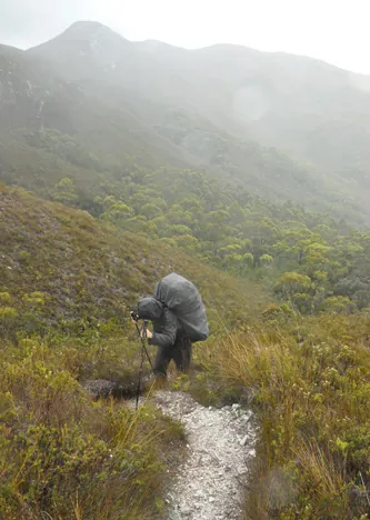 Waterproofs on, we trudge up Red Point Hills