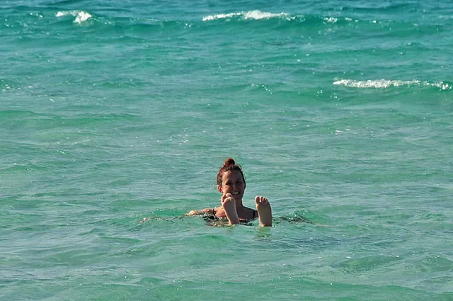 Gill bobbing about in the shallow waves