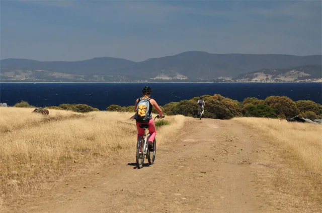 Mountain biking is probably the better way to see the island in our opinion