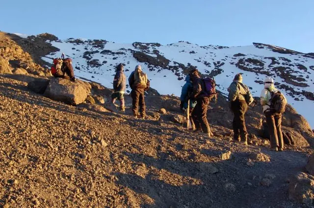 The top of the main crater edge, Stella Point, is in sight