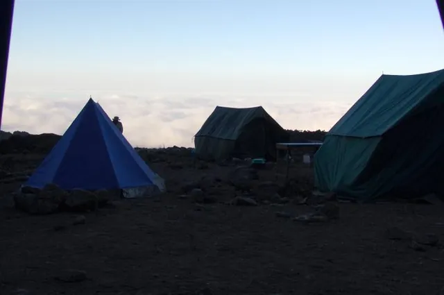 Another idyllic morning view above the clouds as seen from inside our tent