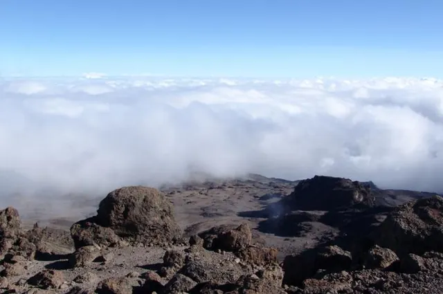 The cloud has engulfed the camp as we return back down to the tents