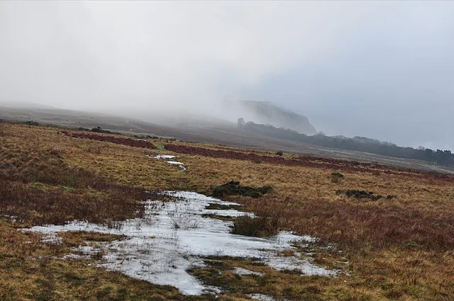 Mist rolling in over the hills