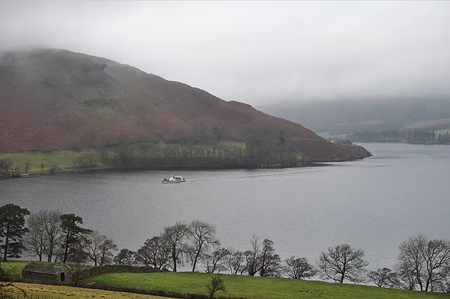 The Ullswater ferry making its way to Howtown pier