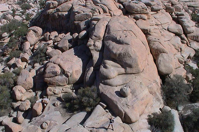 Gill dwarfed by the large rocks below