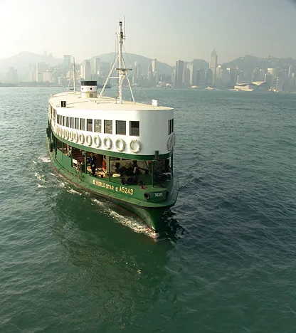 The Star Ferry pulls up to Hung Hom pier to take us across