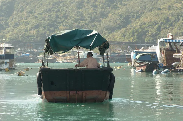 The sampan is the local's transport of choice for travel from their house boats