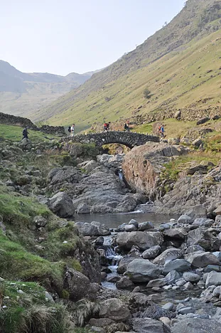 Hikers crossing Stockley Bridge
