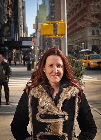 Gill loving her new coat and welcoming comments from strangers all over the U.S.