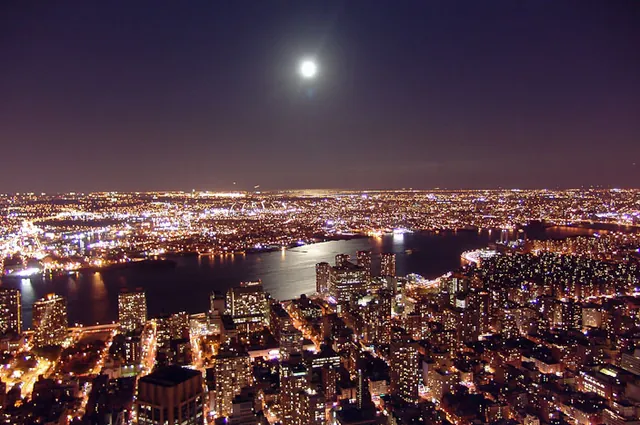 A slow shutter speed shot looking across the East River to Brooklyn and Queens