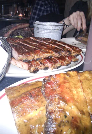 Three different racks of ribs and 5 x side dishes ... slightly too much food leading to a painful finish