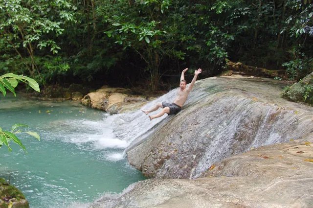 Having some fun on the way down on one of the natural water slides (see Video 1)