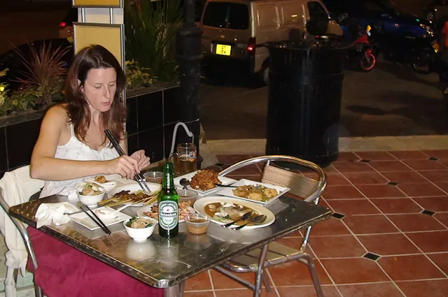Tucking into the famous satay at the Lau Pa Sat hawker centre (See Video 1)