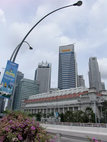 The posh Fullerton boutique hotel sits beneath the towering Singapore skyline