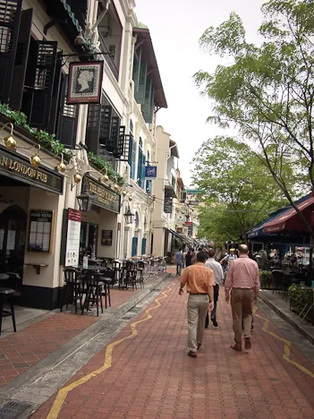 I like to call this the "Avenue of menu thrusting abuse" - head into the irish pub instead!