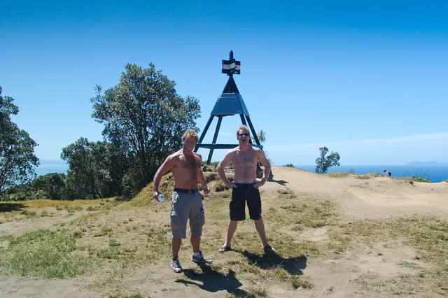 Mountain men conquer the top [some chest inhalation for victory moment]
