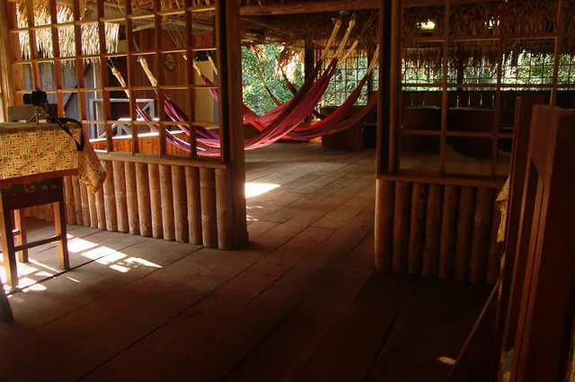 Basic but homely inside. Many a cold beer was downed swinging in those hammocks at night
