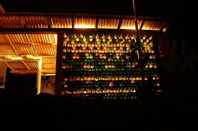 The shower room walls are made from recycled bottles