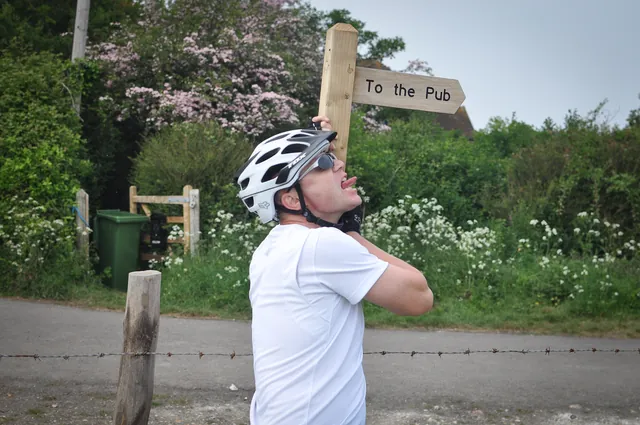 After a particularly vicious hill, we were taunted by this sign (pointing in the wrong direction I should add!)