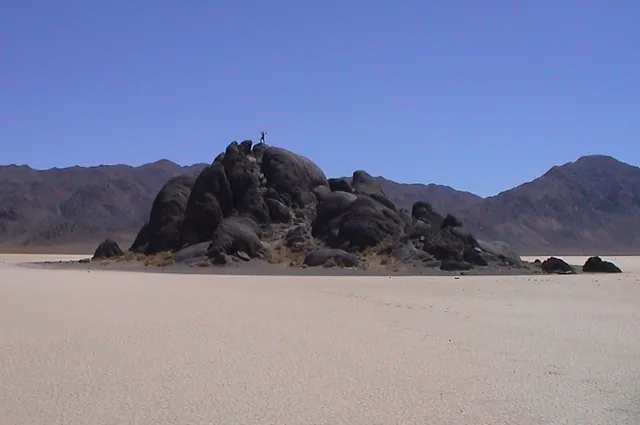 An island in the middle of a dry lake