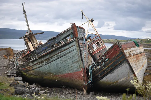 Some old boats stacked up to rot on the route up to Tobermory