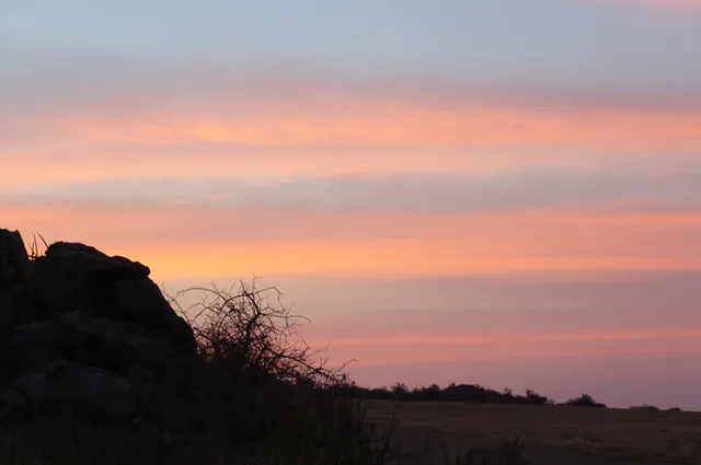 A pink sunset on our late arrival at camp after a day exploring Ngorongoro Crater