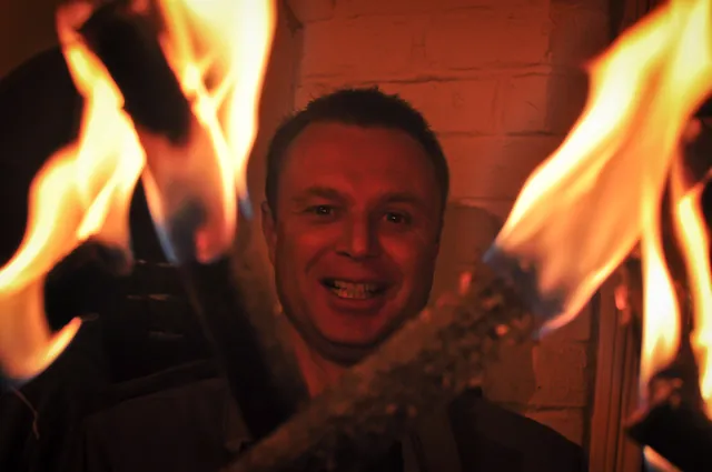 Neil imprisoned in a fiery cage