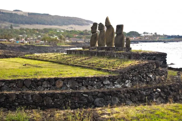 A line of Moai's guard the little town on the island