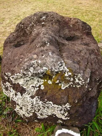 This guy could use a chemical peel!  A weather-worn Moai.