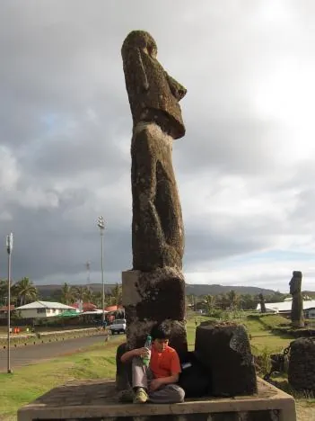 Locals cuddling at the base of Mr. Moai.