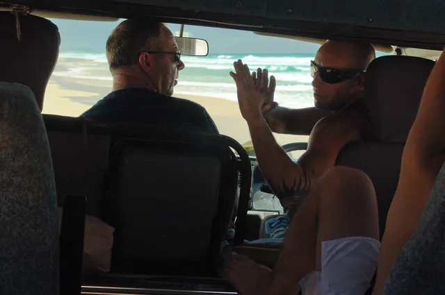 Nev explaining about some of the recent shark encounters on the beach