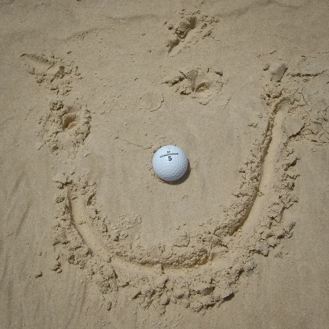 A golf ball on the beach - let's leave it to amuse the next passersby