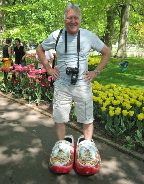 Mr Mike in oversized clogs