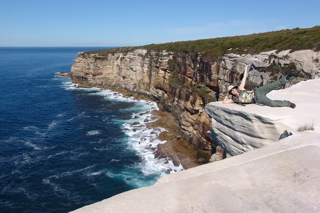Gill hoping the rock ledge will hold for the photo
