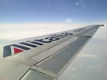 We flew with the national flag carrier airline Alitalia