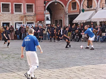 A local 5-a-side footy match in one of the city squares