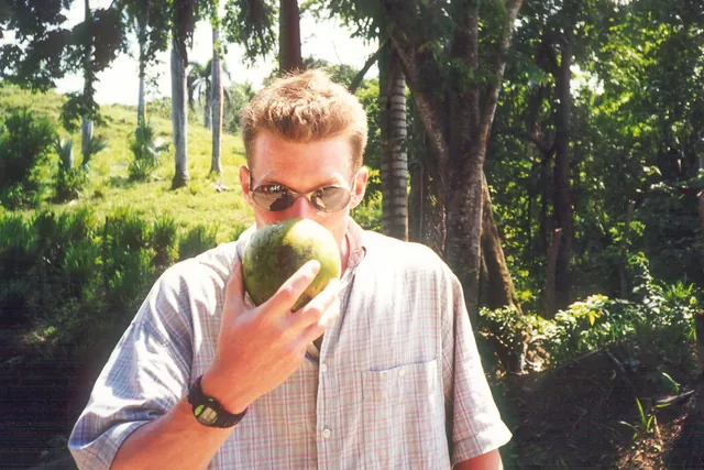 Sampling fresh coconut out on a day trip