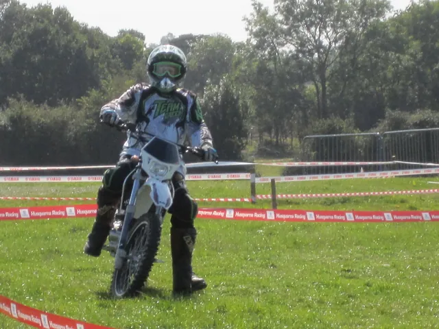 Mr Mike getting to grips with the first bike on the training ground