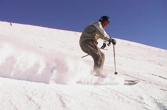 Scraping a bit of pow on the skis - good work!