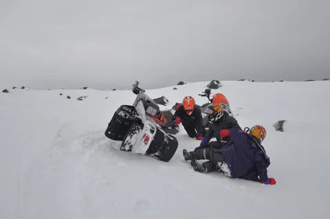 Ooops - shortly after starting, the couple who joined us (actually on their honeymoon) come a cropper and overturn the snowmobile