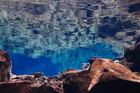 Beautiful, rippling water reflections looking above