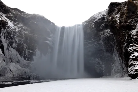 A slow shutter, ND9 shot of Skogarfoss - the spray and mid-day timing kills it a bit