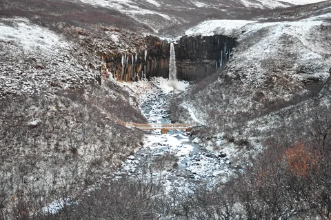 Svartifoss, as seen from afar on the approaching path