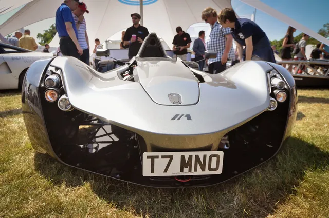 The BAC Mono, as recently seen on Top Gear. Seems expensive compared to the Atom, but I'm sure there's some pretty exotic materials incorporated.