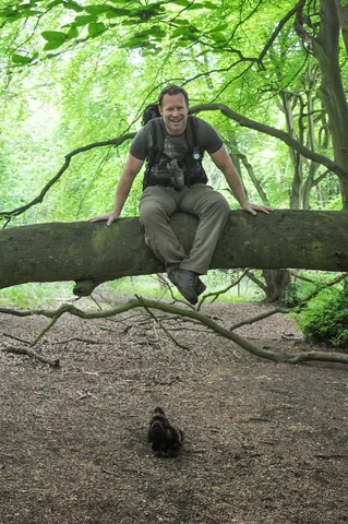 Barney was not happy about me being up on the tree branch